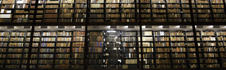 Towering shelves of books in a library